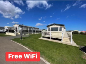 Buttercup Meadow Golden Anchor park, Chapel St. Leonard, modern 6 berth caravan, dog friendly, WiFi